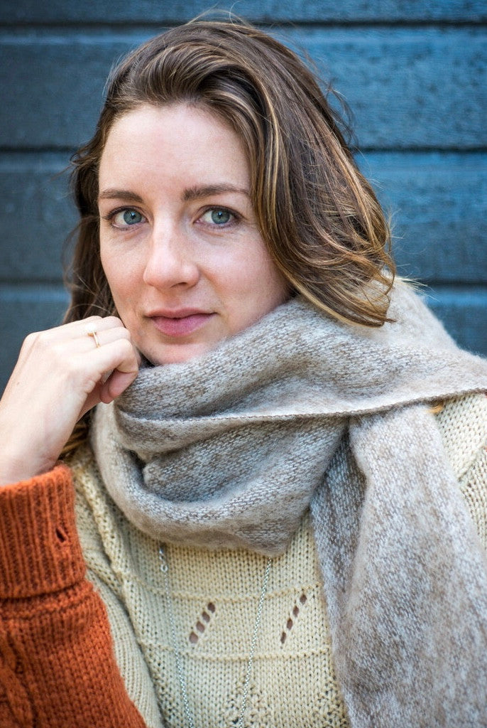 Woman wearing scarf in colour Pumice