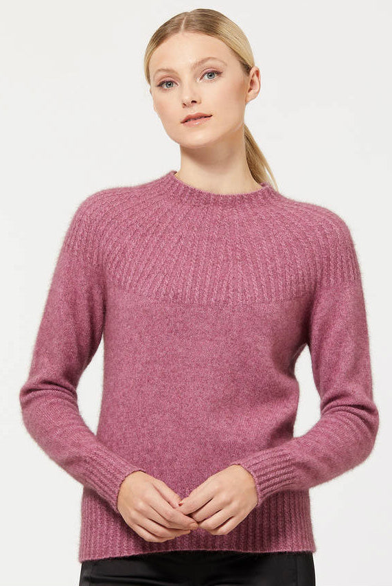 Model wearing Yoke neck cable jersey in colour Heather