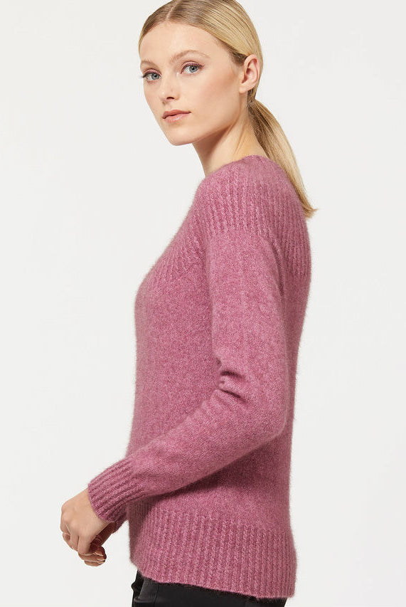 Heather colour cable jersey. Side view