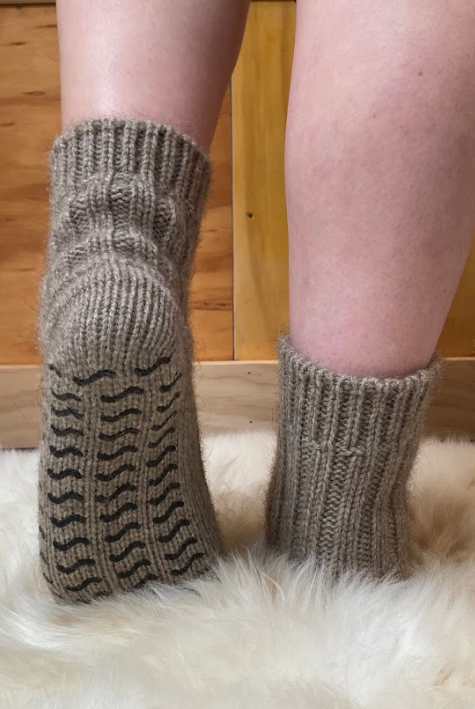 Pair of Natural Merino and Possum wool socks on feet.