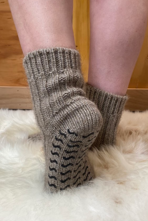 Merino and Possum wool socks on feet.