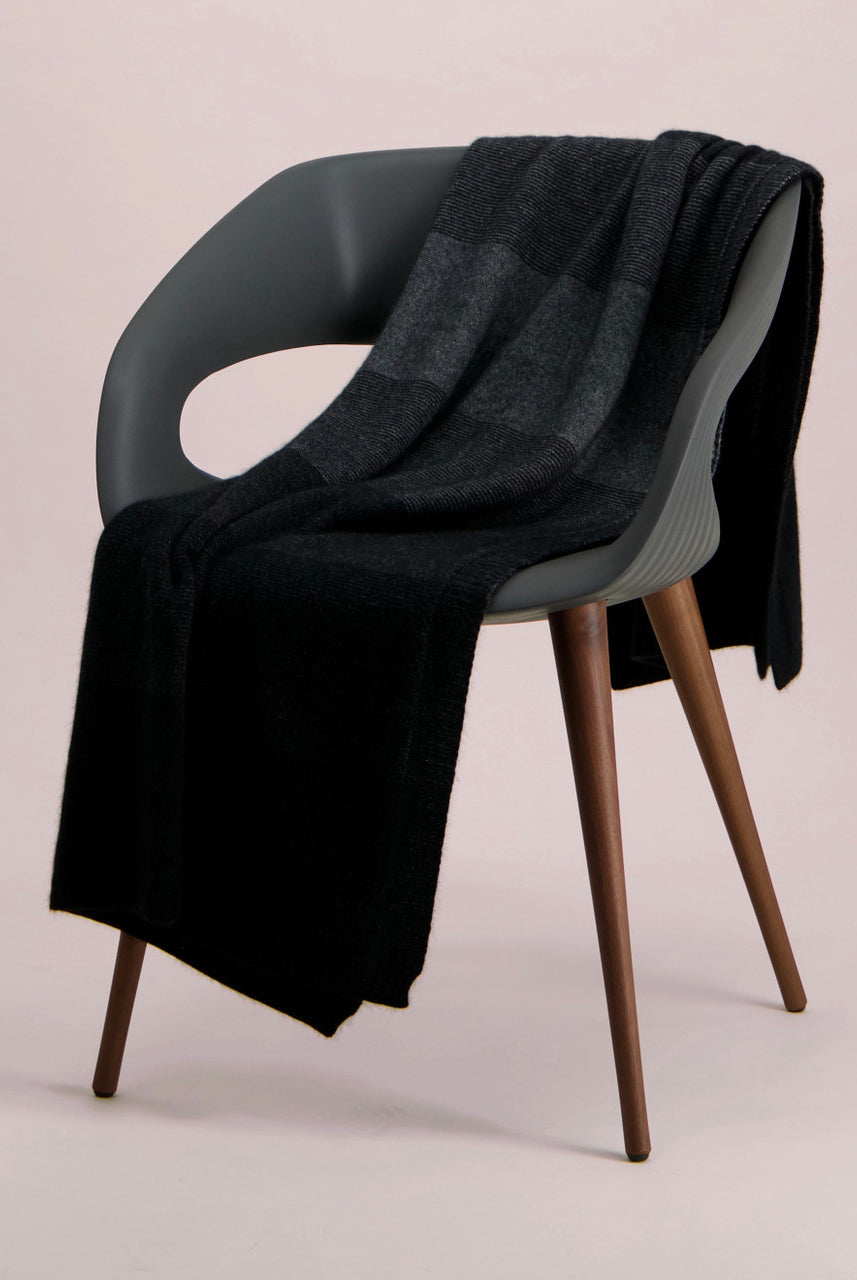 McDonald - Merino & Possum Ombre Throw (5020)-Black/Charcoal/Pewter colour throw on chair