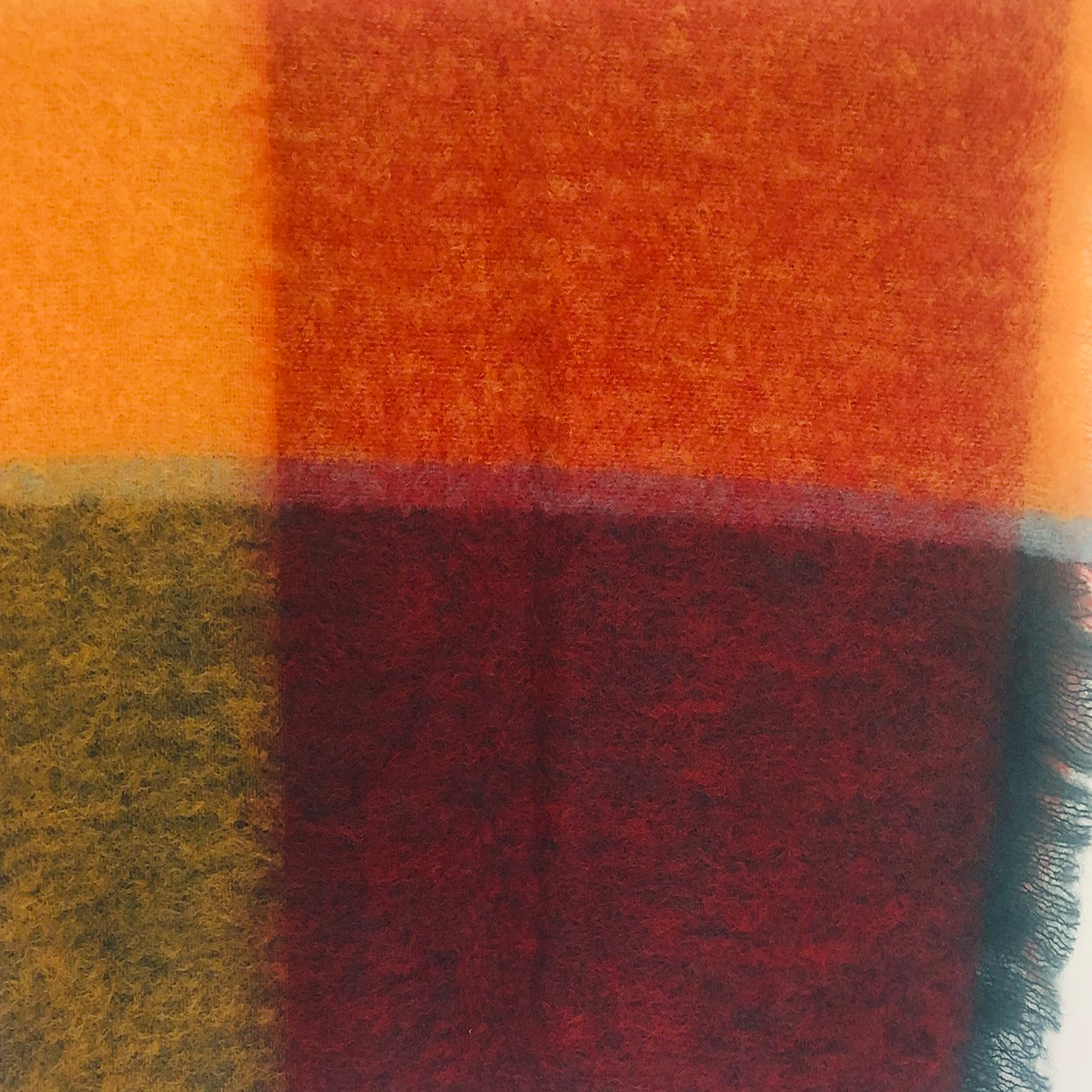 Close up of Picasso plaid mohair blanket