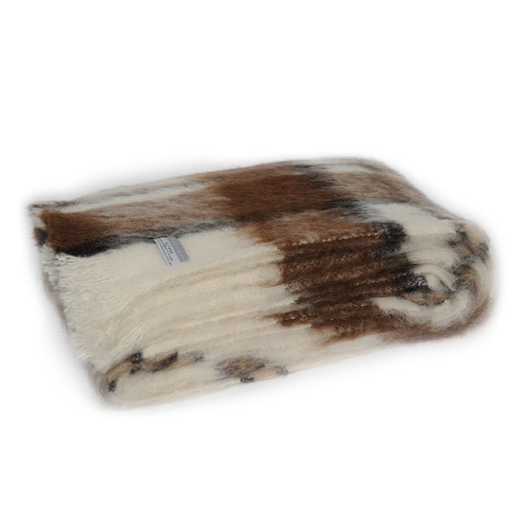 Folded Alpaca fleece throw in Apache colour.