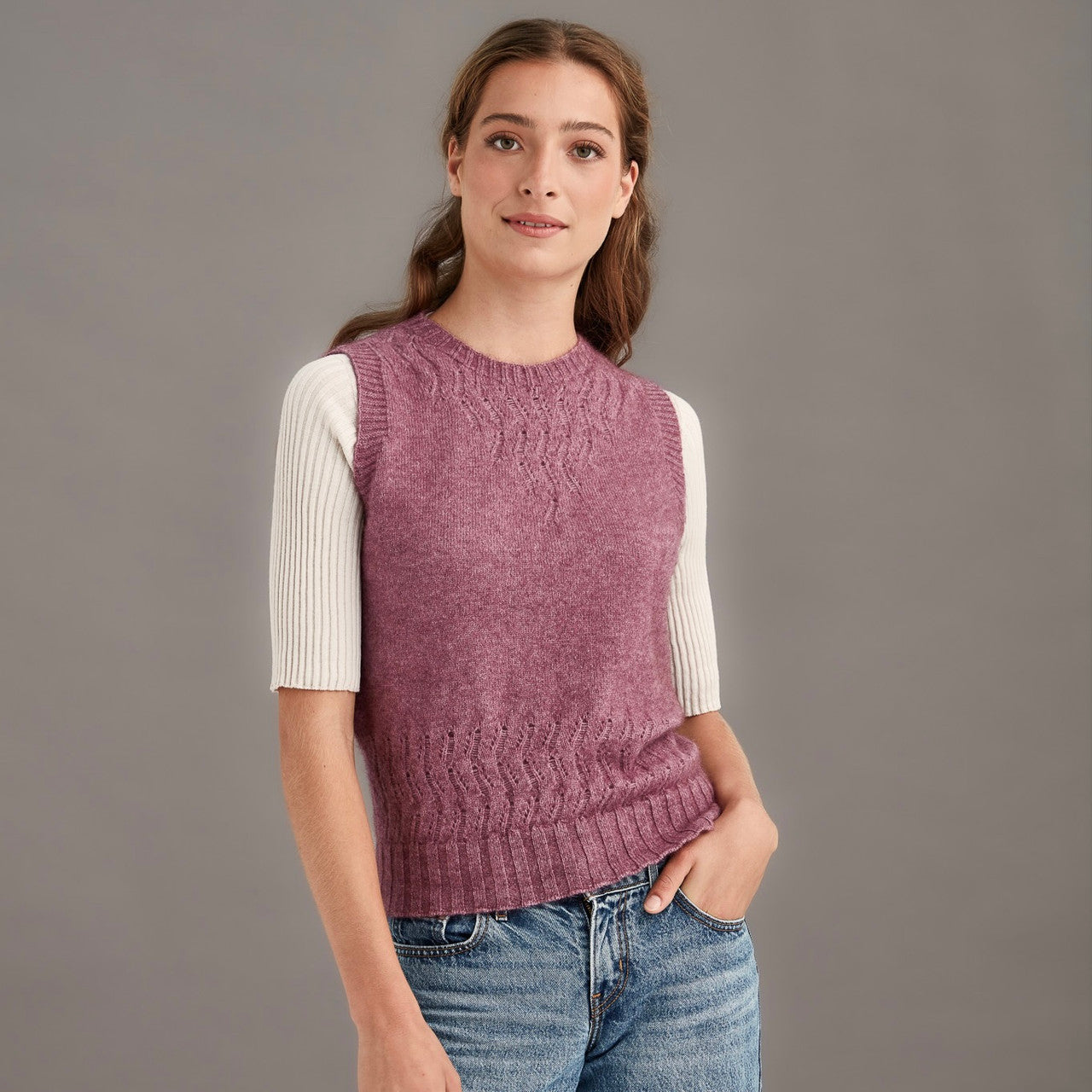 Woman wearing McDonald - Merino & Possum Herringbone Lace Vest (5059) in the colour Heather.