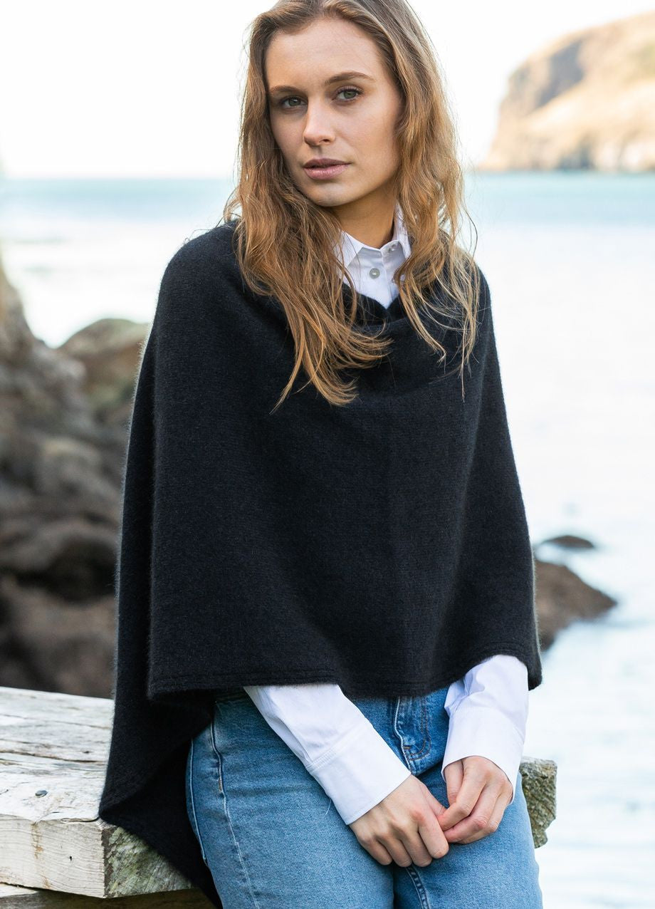 Woman wearing Noble Wilde - Merino & Possum North Cape (NW3086) in the colour Black.