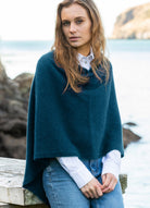 Woman wearing Noble Wilde - Merino & Possum North Cape (NW3086) in the colour Tui.