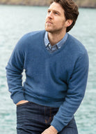 Man wearing the Noble Wilde - Merino & Possum Oxford Vee Sweater (NW1002) in the colour Bahama.