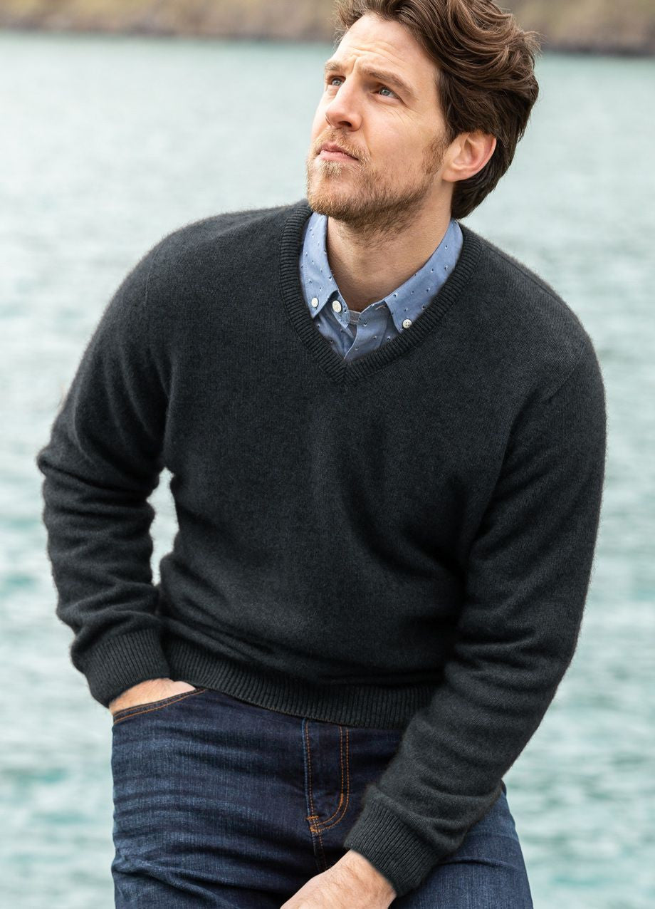 Man wearing the Noble Wilde - Merino & Possum Oxford Vee Sweater (NW1002) in the colour Charcoal.