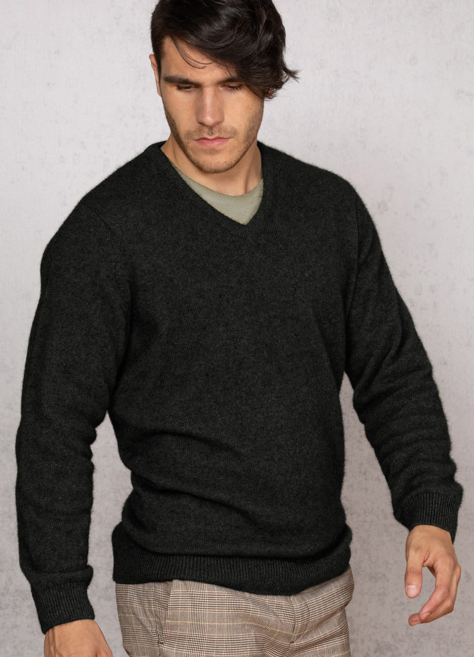 Man wearing the Noble Wilde - Merino & Possum Oxford Vee Sweater (NW1002) in the colour Black.