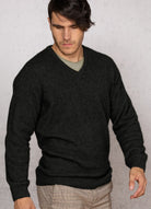Man wearing the Noble Wilde - Merino & Possum Oxford Vee Sweater (NW1002) in the colour Black.