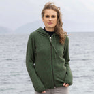 Woman wearing Noble Wilde - Merino and Possum Oulu Hoodie (NW3231) in the colour Jungle.