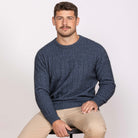 Man wearing Noble Wilde - Merino & Possum Riverton Sweater (NW1101) in the colour Neptune.