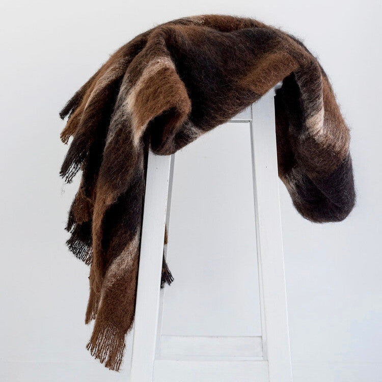 Draped Alpaca fleece throw in Buffalo colour.