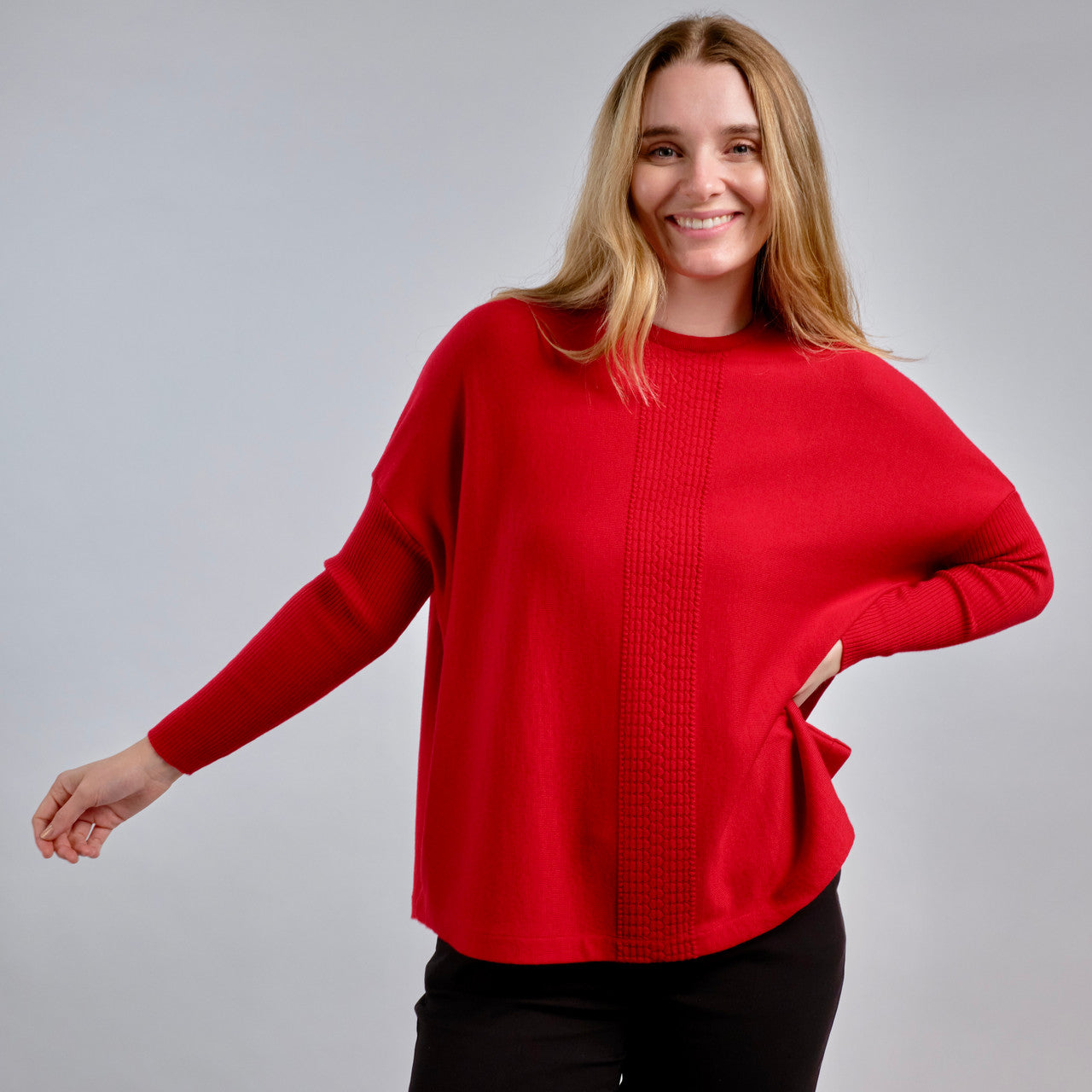 Woman wearing Country Laine - Merino Swing Jumper (CL0075) in the colour Blood Red.