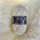 Ball of yarn in colour cream.