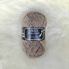Ball of yarn in colour light brown.