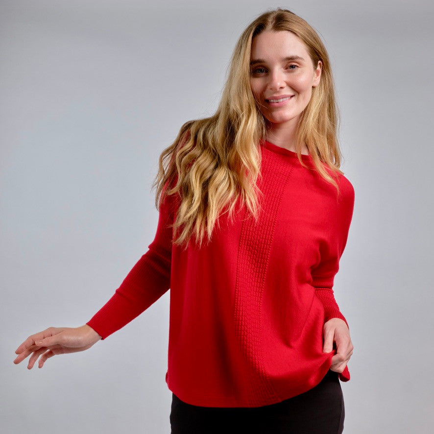 Woman wearing Country Laine - Merino Swing Jumper (CL0075) in the colour Blood Red.