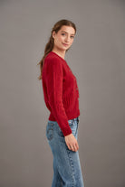 Woman wearing McDonald - Merino & Possum Patchwork Cardigan (5062) in the colour Red.