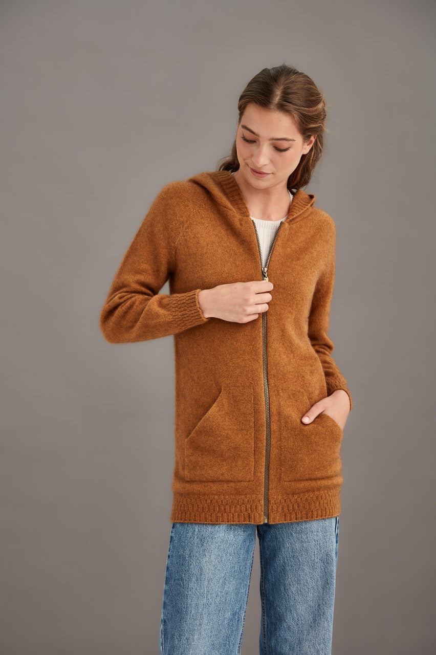 Woman wearing McDonald - Merino & Possum Stepped Stitch Hoodie (5063) in the colour Honeycomb.