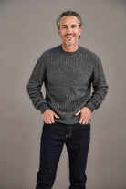 Man wearing McDonald - Merino & Possum Patchwork Sweater (6641) in the colour Pewter