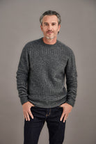 Man wearing McDonald - Merino & Possum Patchwork Sweater (6641) in the colour Pewter