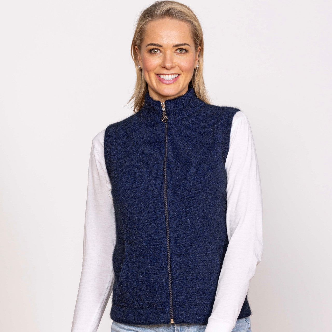 Woman wearing Noble Wilde - Merino & Possum Gilet Zip Vest (NW3101) in the colour Maritime.
