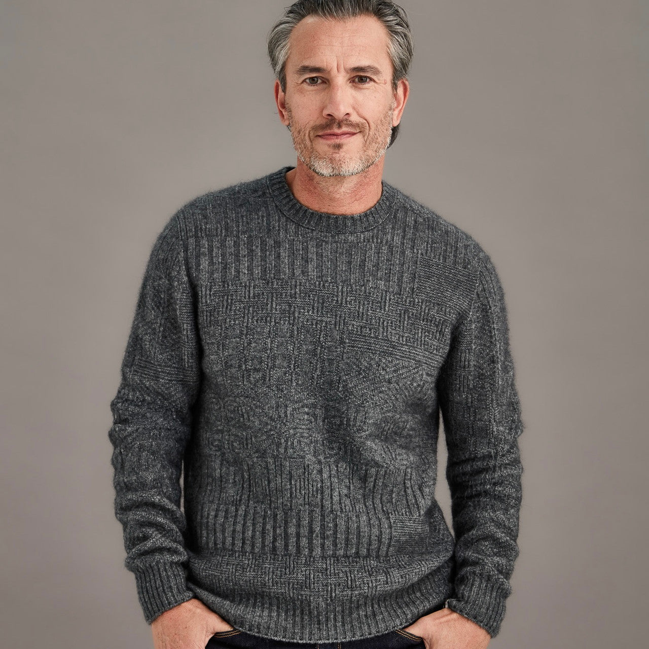 Man wearing McDonald - Merino & Possum Patchwork Sweater (6641) in the colour Pewter