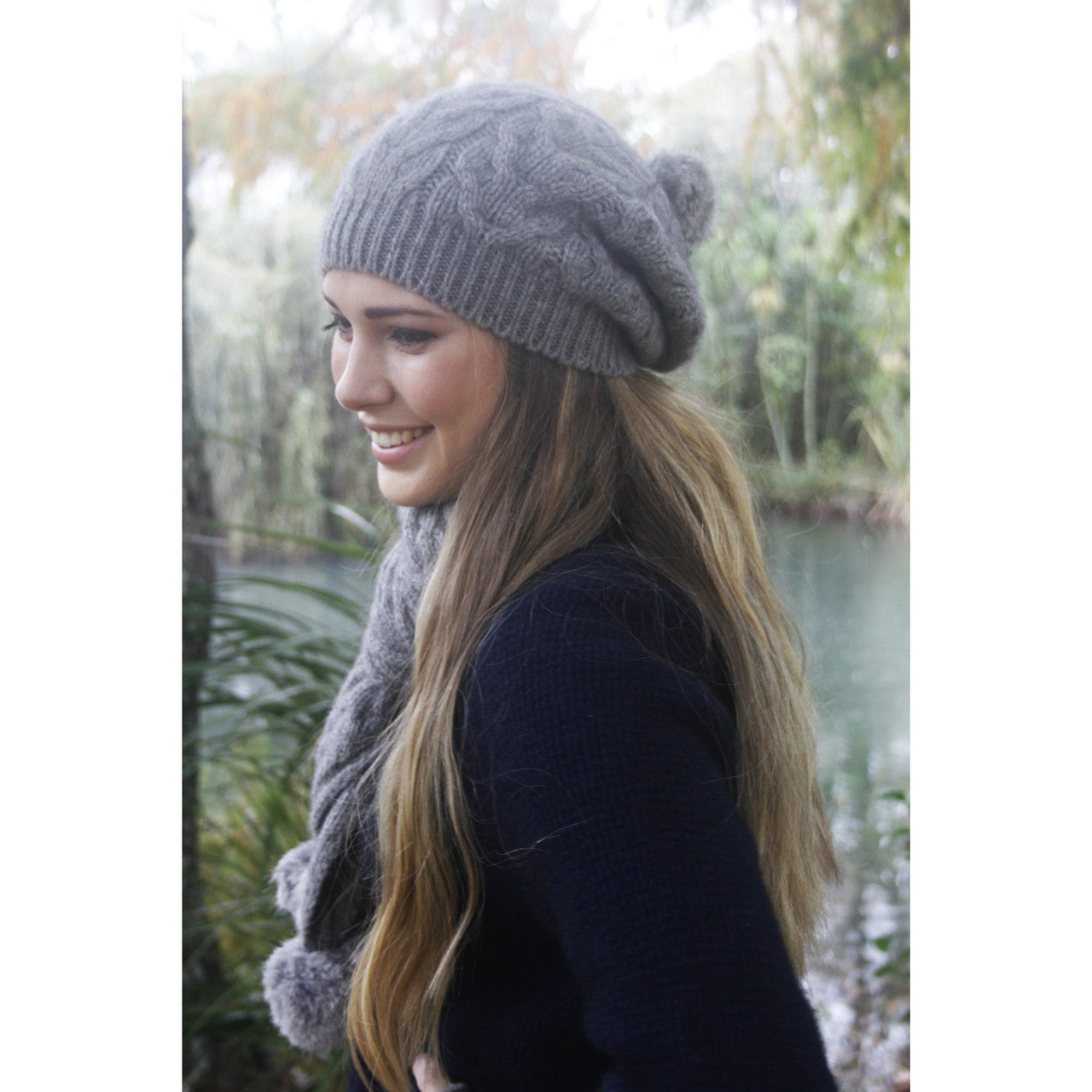 Beanie with pom pom in colour Silver