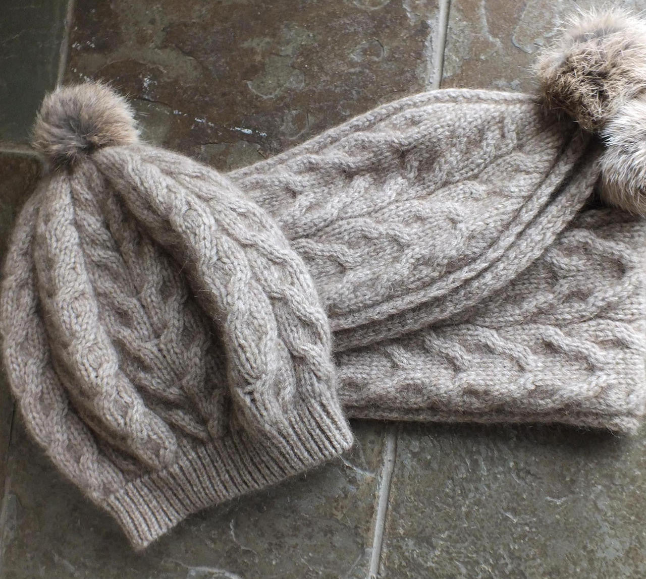 Natural-beanies with pom poms.