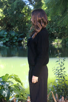 Woman wearing the Lothlorian - Merino & Possum Fuse Tie Jacket (9972) in the colour Black.