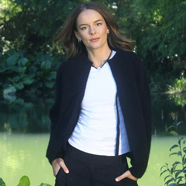 Woman wearing the Lothlorian - Merino & Possum Fuse Tie Jacket (9972) in the colour Black.