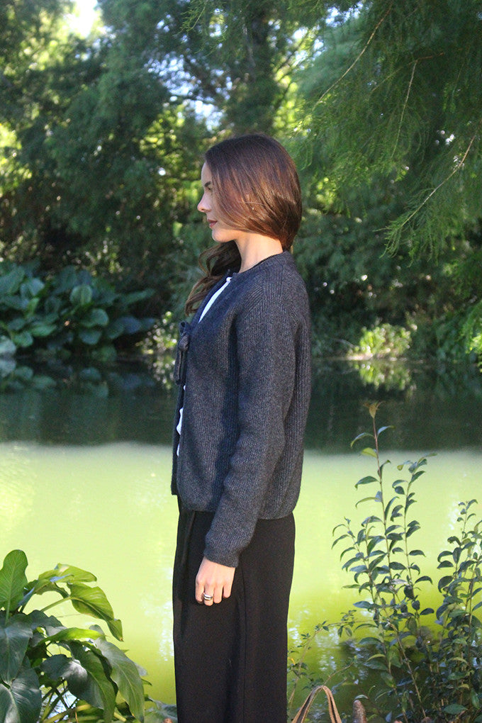 Woman wearing the Lothlorian - Merino & Possum Fuse Tie Jacket (9972) in the colour Charcoal.