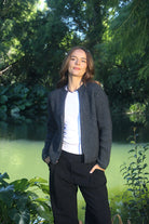 Woman wearing the Lothlorian - Merino & Possum Fuse Tie Jacket (9972) in the colour Charcoal.