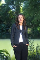 Woman wearing the Lothlorian - Merino & Possum Fuse Tie Jacket (9972) in the colour Charcoal.