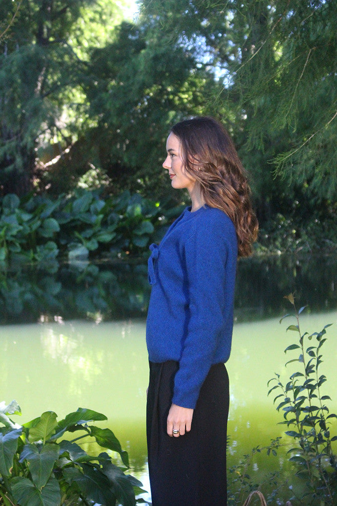 Woman wearing the Lothlorian - Merino & Possum Fuse Tie Jacket (9972) in the colour Lagoon.