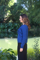 Woman wearing the Lothlorian - Merino & Possum Fuse Tie Jacket (9972) in the colour Lagoon.