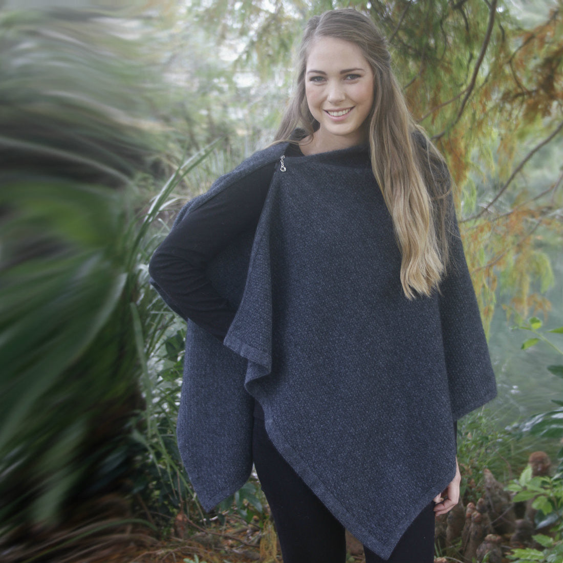Woman with half zipped zippered wrap in colour Charcoal