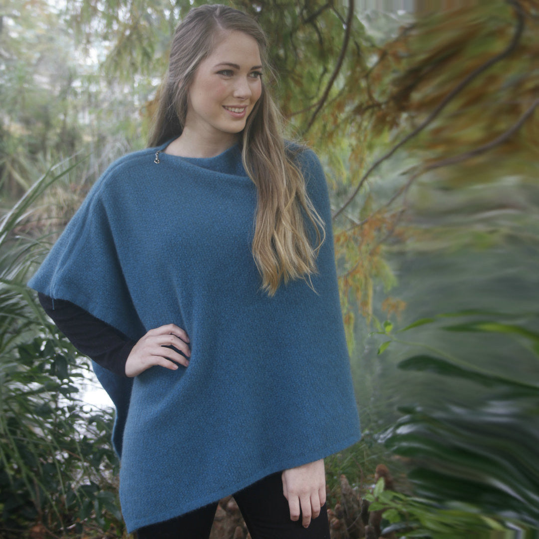 Woman with hand on hip in colour Lagoon