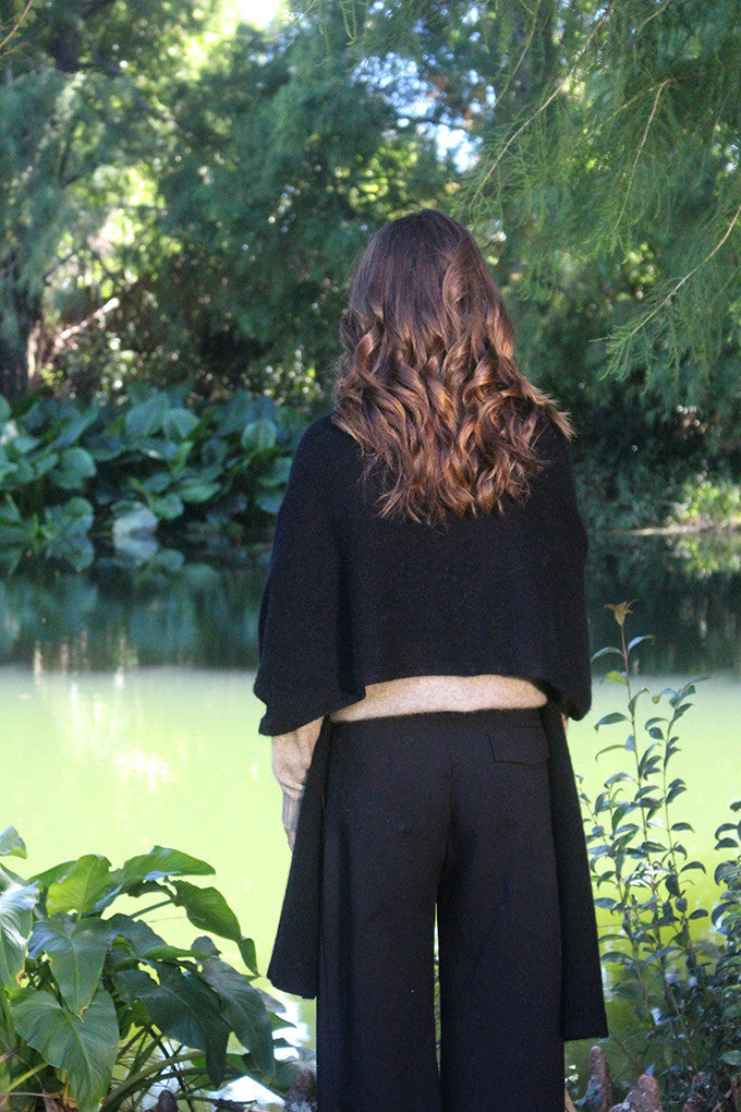 Woman wearing Lothlorian - Merino & Possum Brando Wrap (9993) in the colour Black.