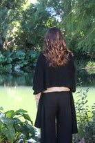 Woman wearing Lothlorian - Merino & Possum Brando Wrap (9993) in the colour Black.