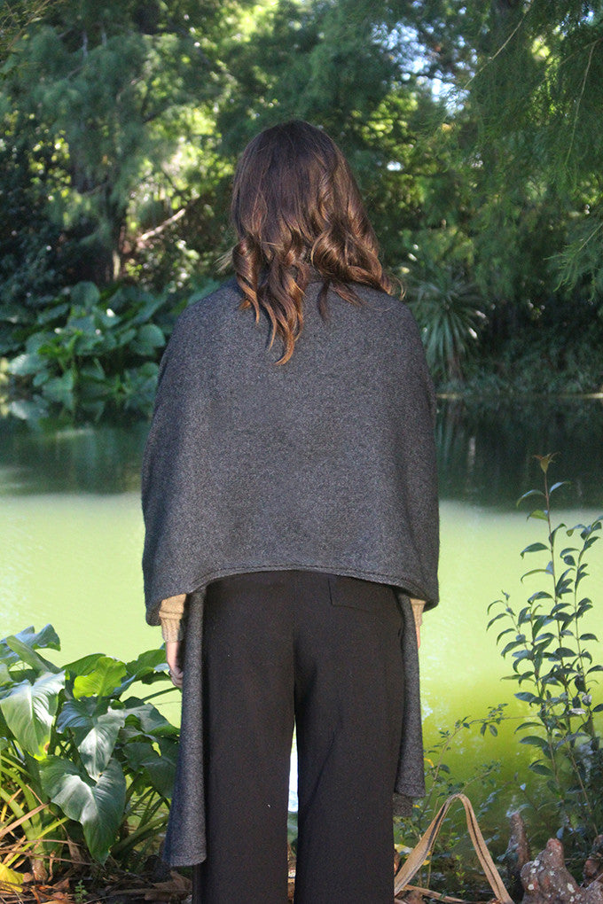 Woman wearing Lothlorian - Merino & Possum Brando Wrap (9993) in the colour Charcoal.