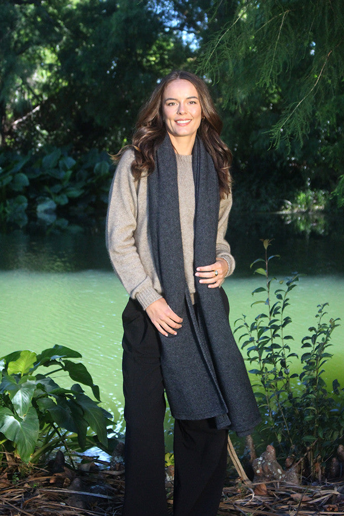 Woman wearing Lothlorian - Merino & Possum Brando Wrap (9993) in the colour Charcoal.