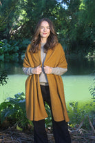 Woman wearing Lothlorian - Merino & Possum Brando Wrap (9993) in the colour Gold.