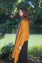 Woman wearing Lothlorian - Merino & Possum Brando Wrap (9993) in the colour Gold.