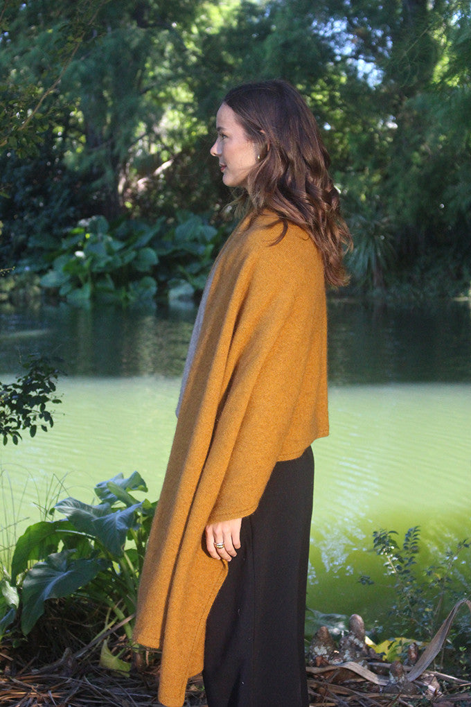 Woman wearing Lothlorian - Merino & Possum Brando Wrap (9993) in the colour Gold.