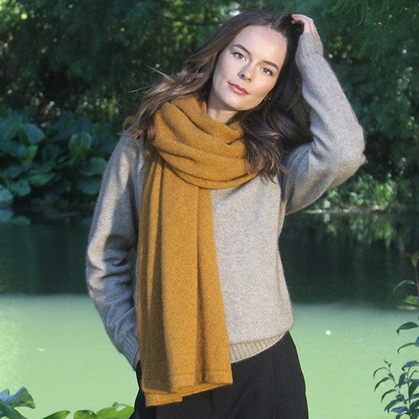 Woman wearing Lothlorian - Merino & Possum Brando Wrap (9993) in the colour Gold.