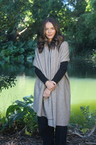 Woman wearing Lothlorian - Merino & Possum Brando Wrap (9993) in the colour Natural.