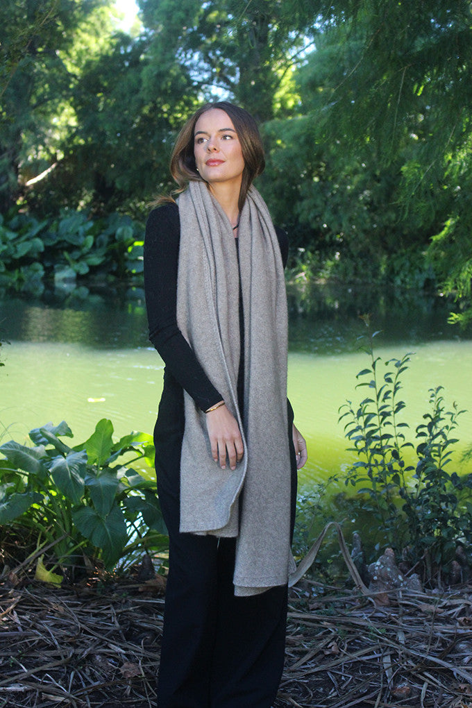 Woman wearing Lothlorian - Merino & Possum Brando Wrap (9993) in the colour Natural.