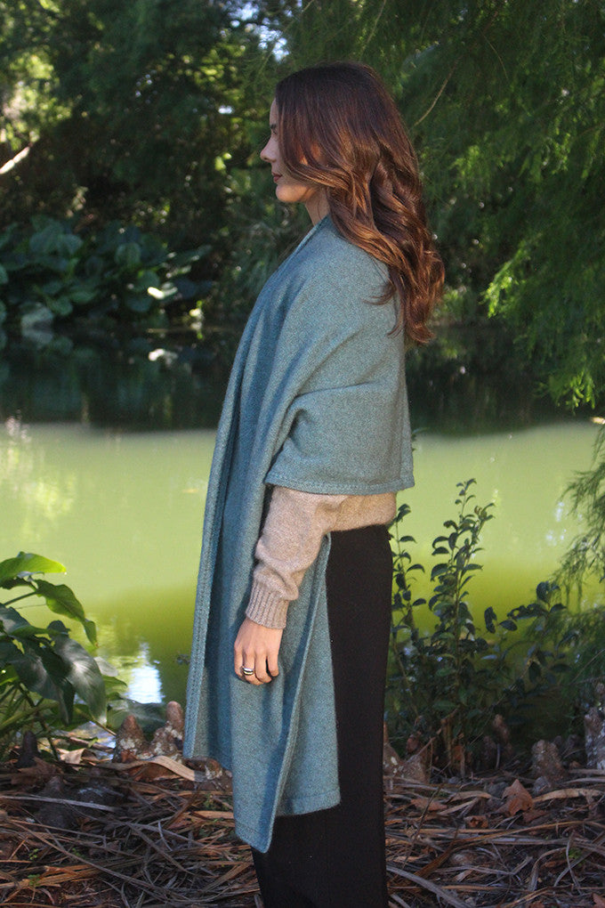 Woman wearing Lothlorian - Merino & Possum Brando Wrap (9993) in the colour Sage.